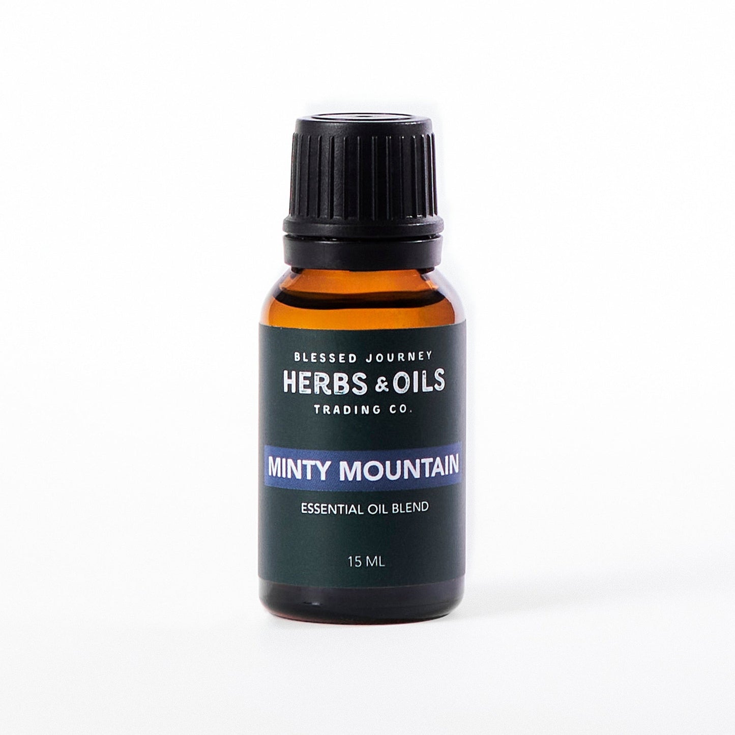 15ml amber glass bottle of Minty Mountain Essential Oil Blend for respiratory support and clear breathing