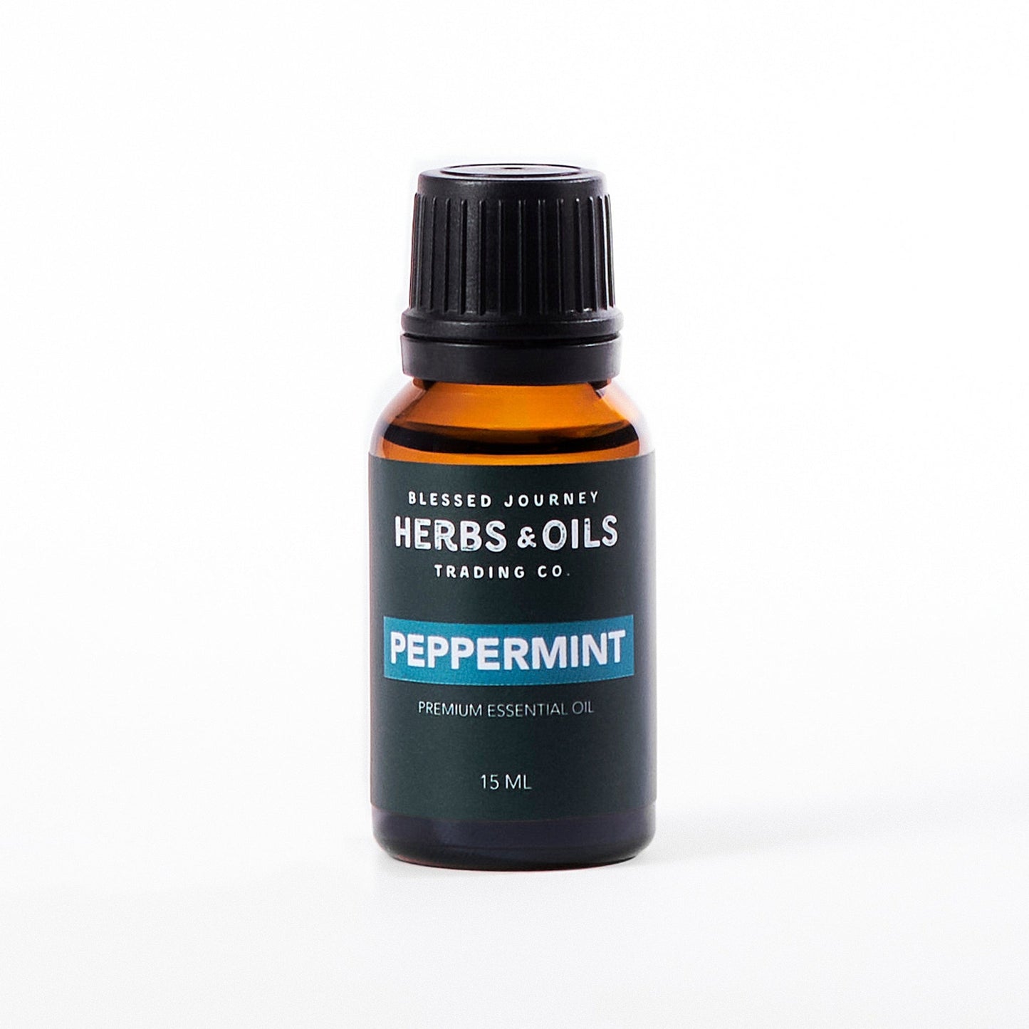 Amber glass bottle of 15ml peppermint essential oil with black cap and Herbs & Oils Trading Co. label