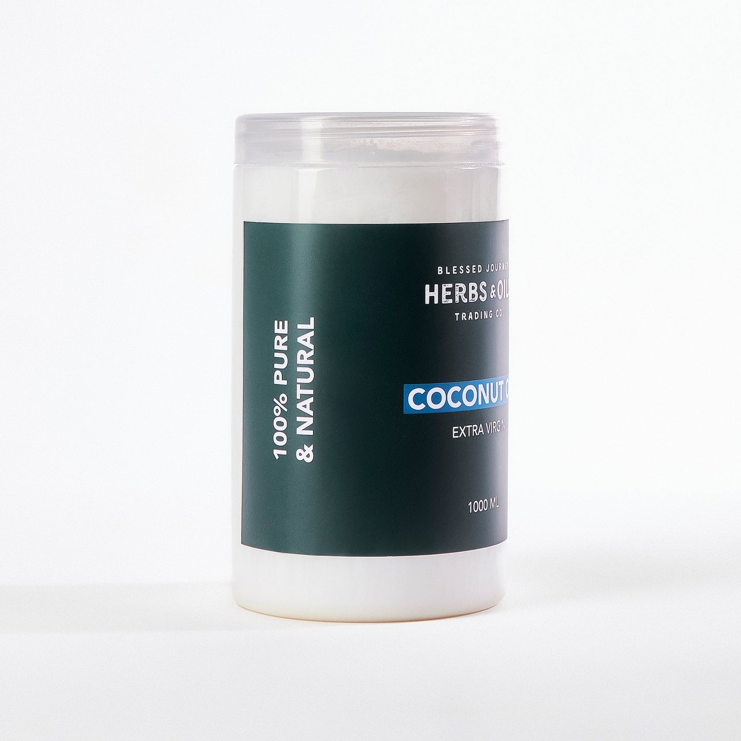 100% pure natural extra virgin coconut oil in white jar with green label for cooking and skincare