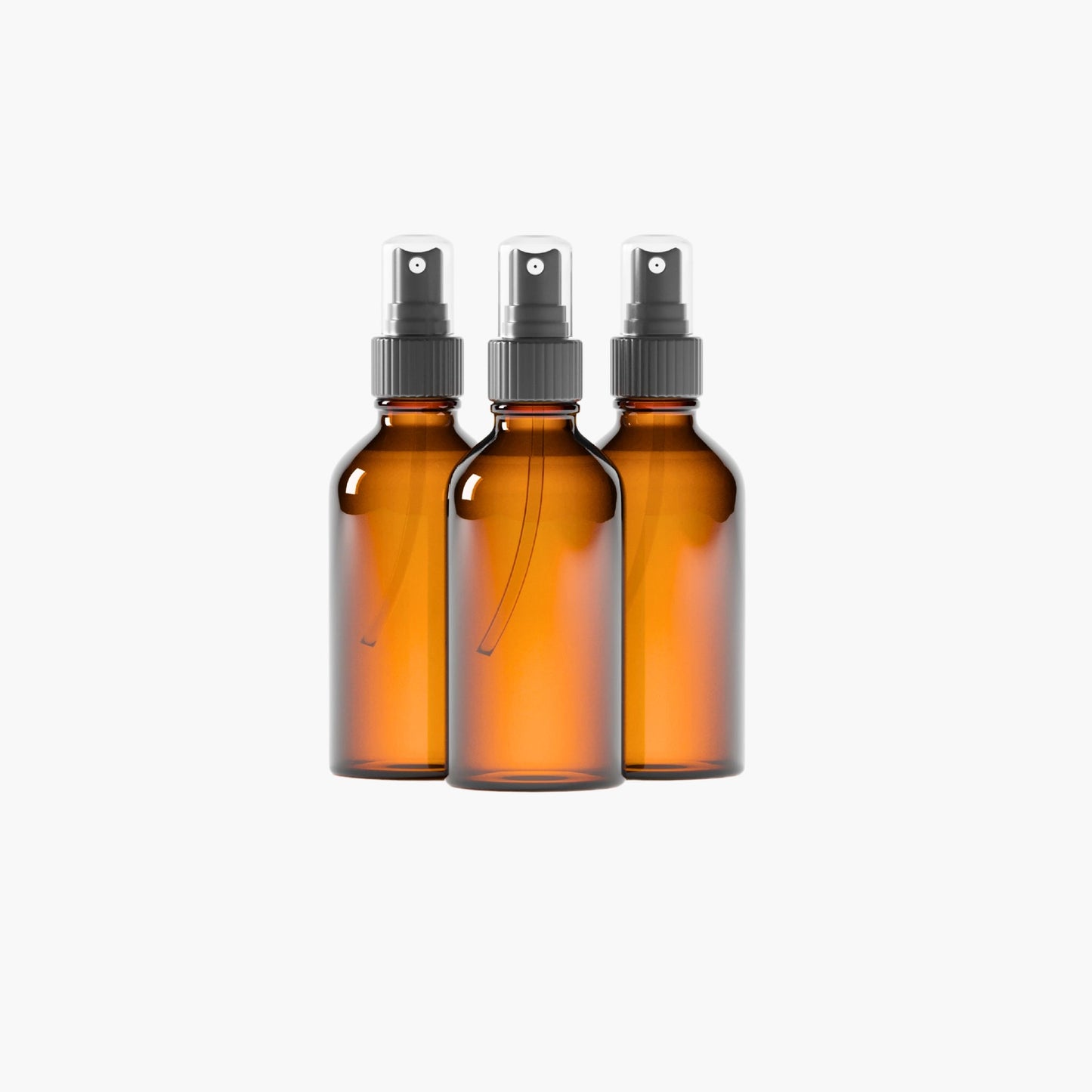 Set of three 200ml amber glass spray bottles with black spray caps for essential oils and skincare mists.