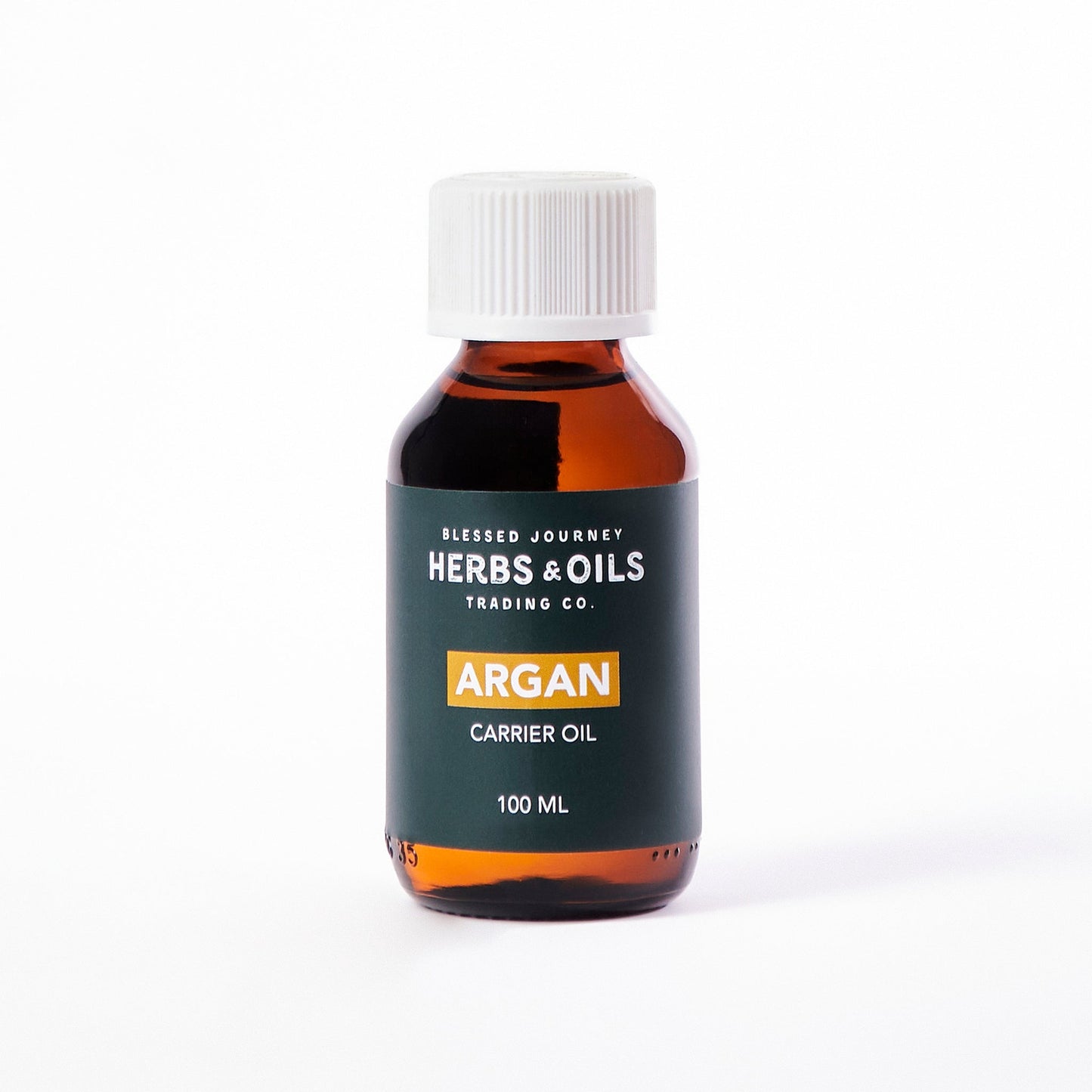 100ml bottle of 100% pure natural Moroccan Argan oil in dark amber glass with white cap for skin, hair, and nail care.