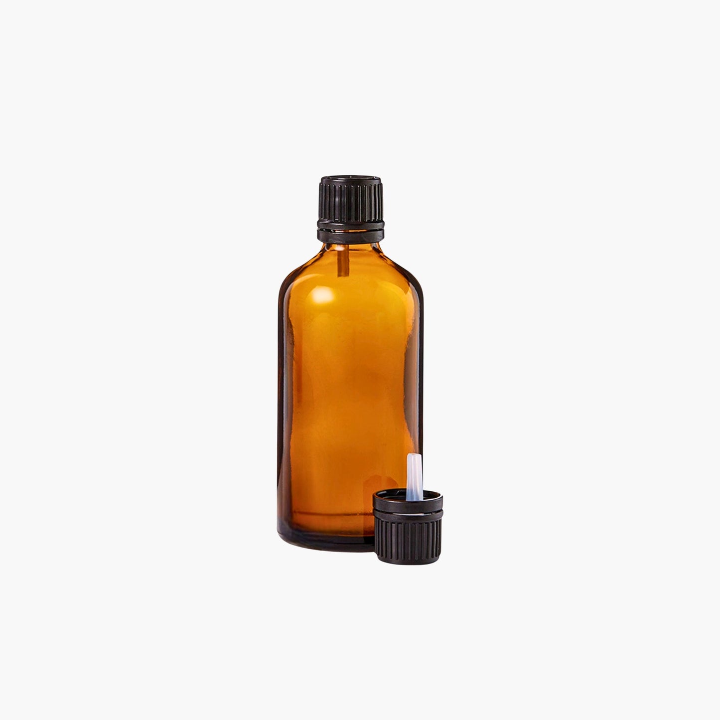100ml amber glass bottle with black ribbed cap and orifice reducer for essential oils - Amber Glass Bottles Egypt