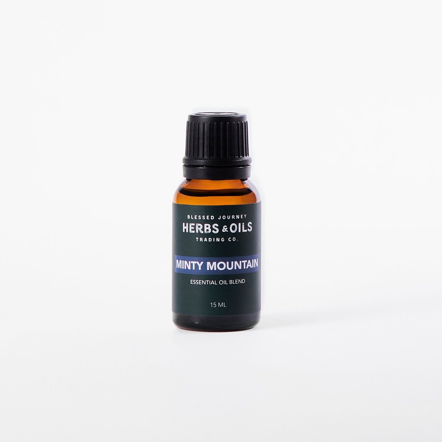 Amber glass bottle of Minty Mountain essential oil blend with eucalyptus and peppermint for respiratory support