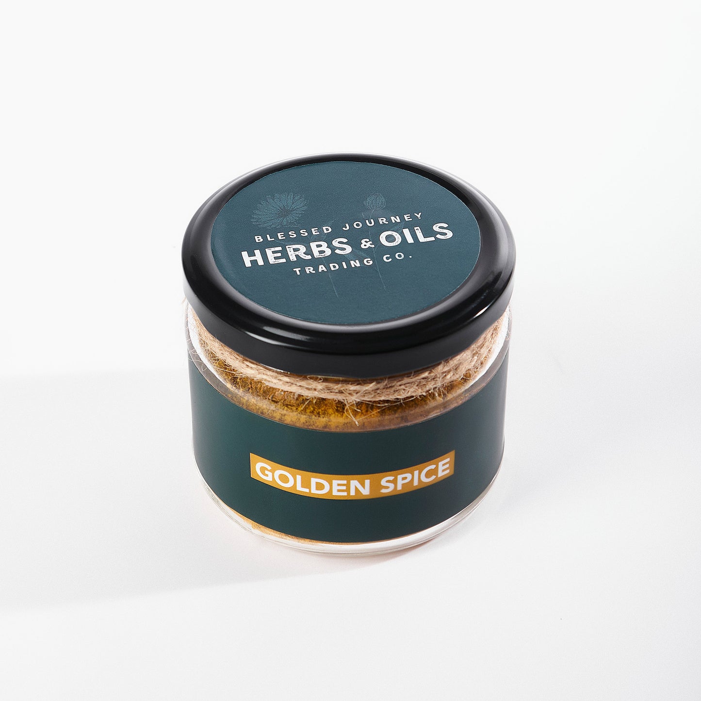 Golden Spice Blend jar with natural turmeric and herbs labeled Herbs & Oils Trading Co.